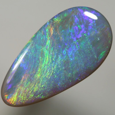 SOLID SEMI BLACK OPAL Iris pattern with gold fire. SEE VIDEO